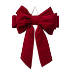 Giant red velvet bow