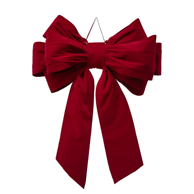 Giant red velvet bow