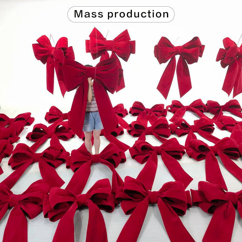 Giant red velvet bow