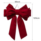 Giant red velvet bow