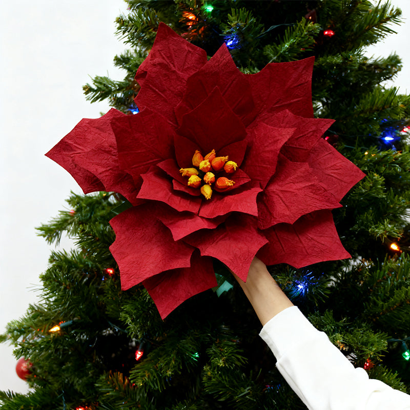 Red artificial paper flower Christmas poinsettia